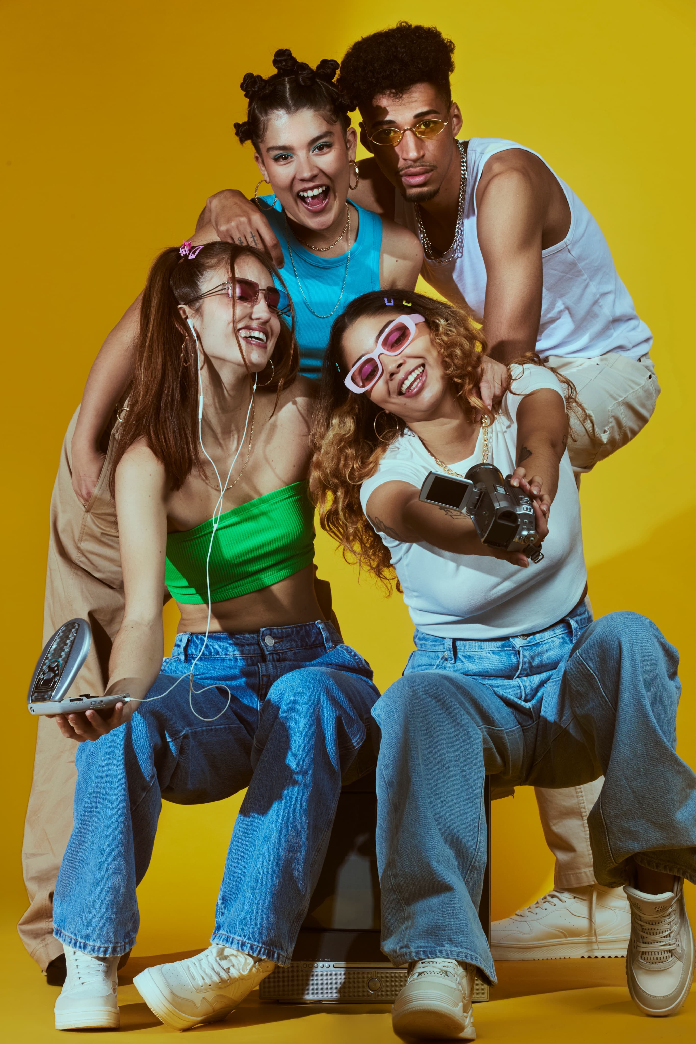 Group of friends showing off new fashion